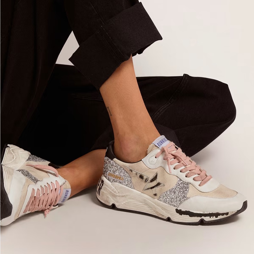 Golden Goose running sole with cream-colored upper and zebra print print skin
